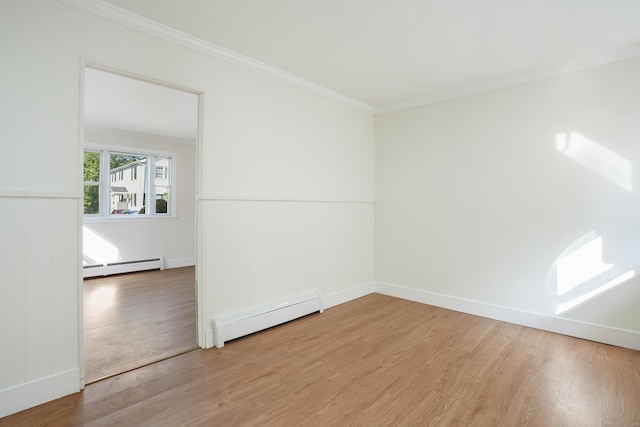 24 S Ave, Danbury, CT 06810 - unfurnished room featuring baseboard heating, wood finished floors, crown molding, and wainscoting