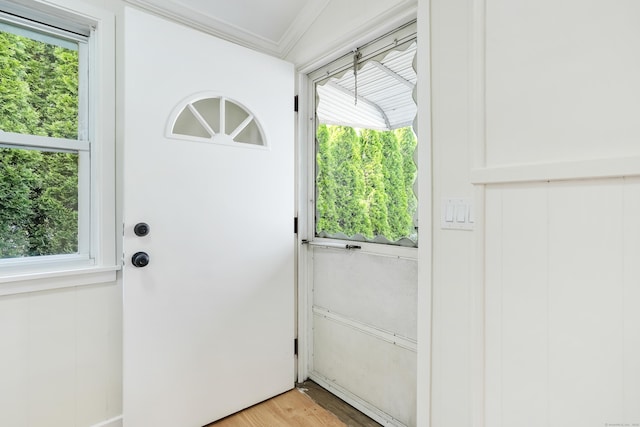 24 S Ave, Danbury, CT 06810 - entryway with ornamental molding and light wood finished floors