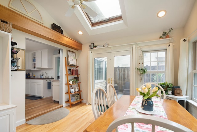 41 Northridge Ave, Torrington, CT 06790 - dining area with a skylight, french doors, recessed lighting, light wood-type flooring, and lofted ceiling