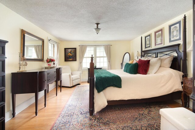 41 Northridge Ave, Torrington, CT 06790 - bedroom featuring light wood finished floors and a textured ceiling