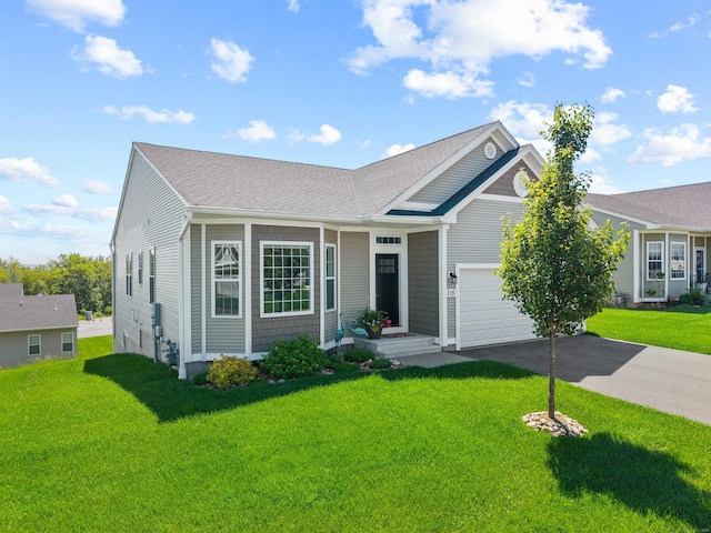115 Webster Ln Unit 115, Middletown, CT 06457 - ranch-style home featuring asphalt driveway, a front lawn, a shingled roof, and a garage