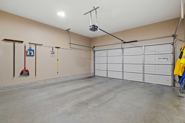 115 Webster Ln Unit 115, Middletown, CT 06457 - garage with a garage door opener and recessed lighting