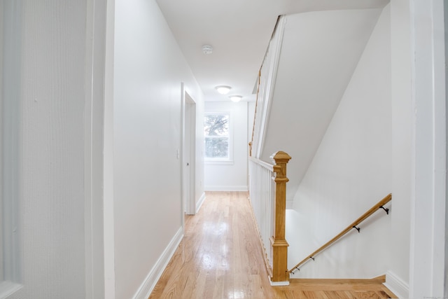 289 E Ave, Bridgeport, CT 06610 - hall featuring an upstairs landing and light wood-style floors