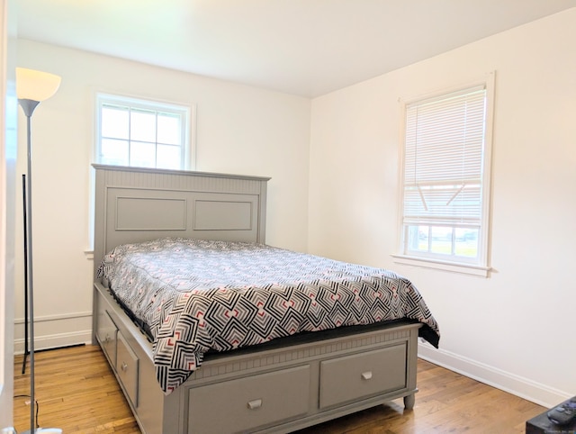 901 William St Apt A, Bridgeport, CT 06608 - bedroom with wood finished floors and baseboards