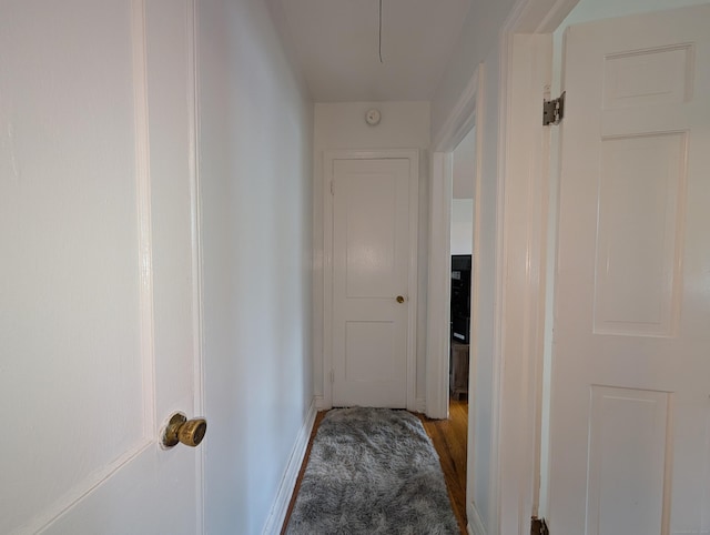901 William St Apt A, Bridgeport, CT 06608 - hall with baseboards and wood finished floors