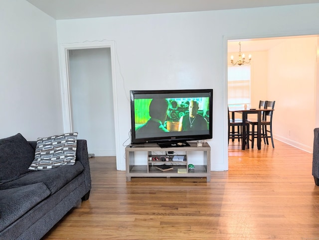 901 William St Apt A, Bridgeport, CT 06608 - living area featuring a chandelier and wood finished floors