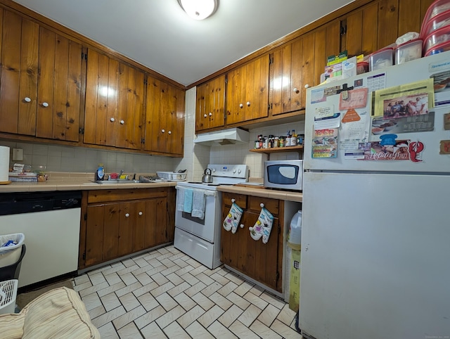 901 William St Apt B, Bridgeport, CT 06608 - kitchen with white appliances, range hood, tile counters, and backsplash