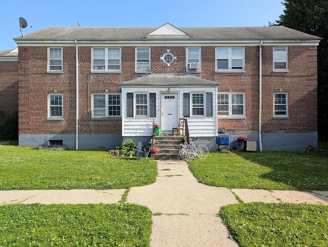 901 William St Apt D, Bridgeport, CT 06608 - view of front facade featuring brick siding and a front yard