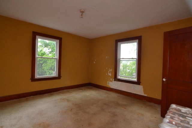 484 W St, Bristol, CT 06010 - unfurnished room featuring healthy amount of natural light and carpet floors