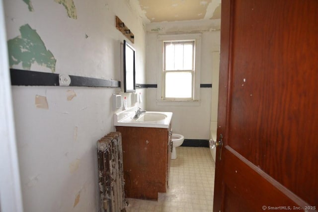 484 W St, Bristol, CT 06010 - bathroom featuring radiator heating unit, tile patterned floors, and vanity