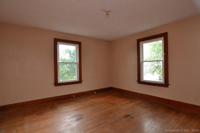 484 W St, Bristol, CT 06010 - unfurnished room with plenty of natural light and wood-type flooring