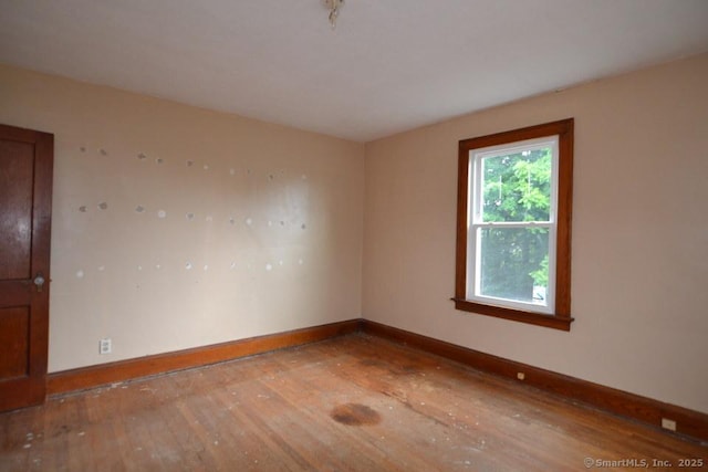 484 W St, Bristol, CT 06010 - unfurnished room with hardwood / wood-style floors and baseboards