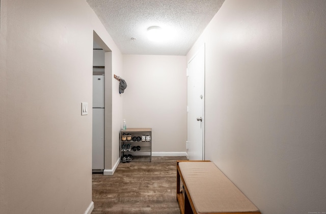 14 Newtown Rd Unit B9, Danbury, CT 06810 - corridor featuring dark wood finished floors and a textured ceiling