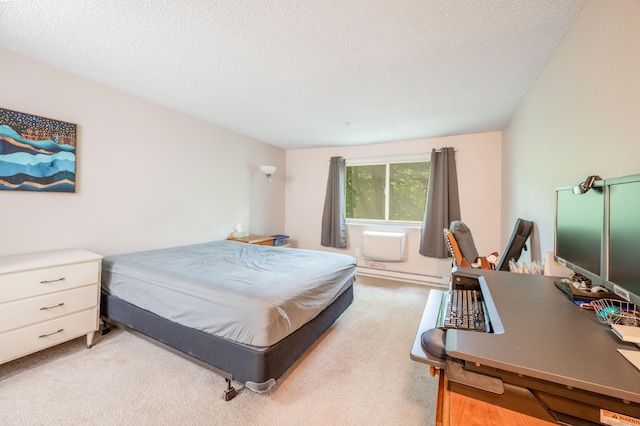 14 Newtown Rd Unit B9, Danbury, CT 06810 - carpeted bedroom with an office area, baseboard heating, and a textured ceiling