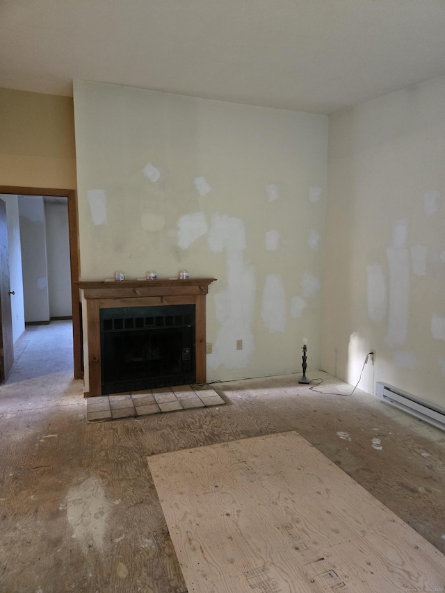 1 Cornfield Pt Unit 1, Woodstock, CT 06281 - unfurnished living room with a baseboard heating unit and a fireplace with flush hearth