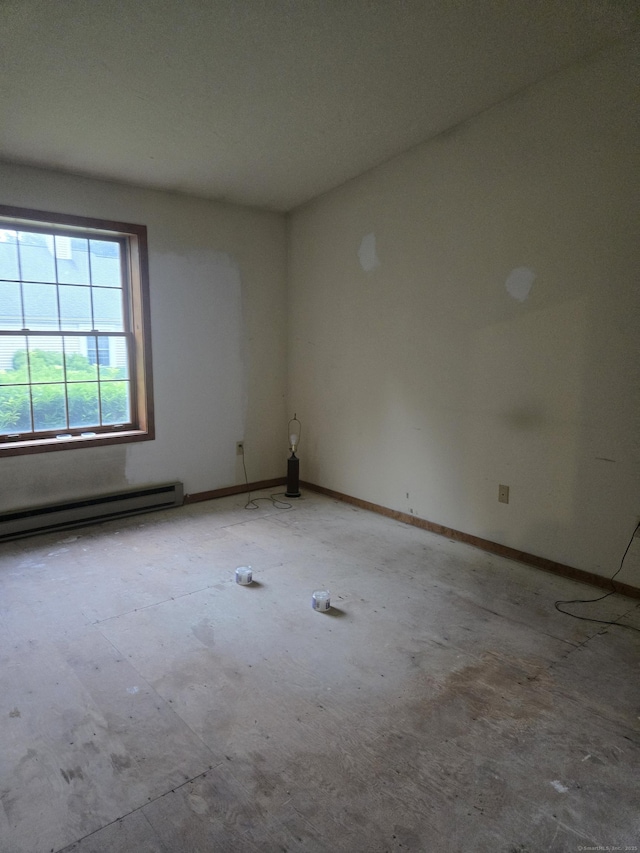1 Cornfield Pt Unit 1, Woodstock, CT 06281 - empty room with a baseboard radiator and baseboards