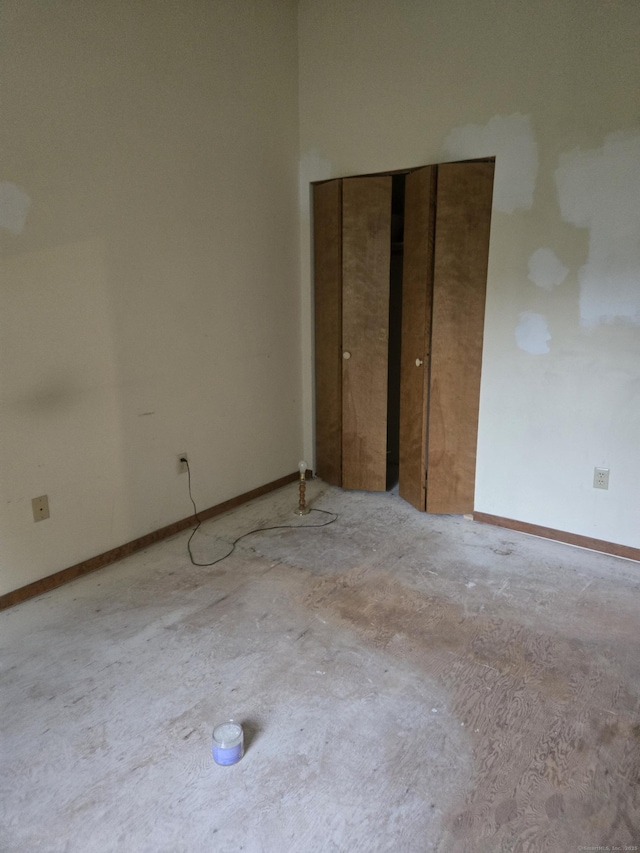 1 Cornfield Pt Unit 1, Woodstock, CT 06281 - unfurnished bedroom with unfinished concrete flooring