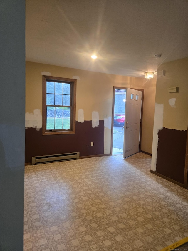 1 Cornfield Pt Unit 1, Woodstock, CT 06281 - empty room featuring a baseboard radiator and baseboards