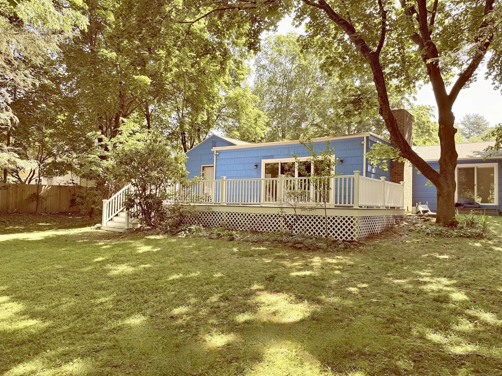 27 Stonecrop Rd, Norwalk, CT 06851 - rear view of house featuring a wooden deck