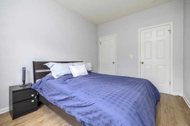 51 Old Kings Hwy Unit 5, Greenwich, CT 06897 - bedroom featuring wood finished floors and baseboards