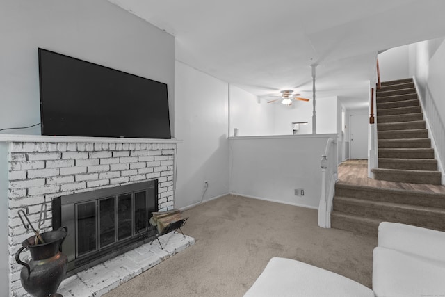 46 Rising Trail Dr Unit 46, Middletown, CT 06457 - unfurnished living room featuring ceiling fan, carpet floors, a fireplace, and stairs