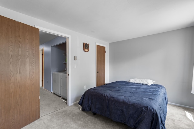 46 Rising Trail Dr Unit 46, Middletown, CT 06457 - bedroom with washer and clothes dryer and light colored carpet