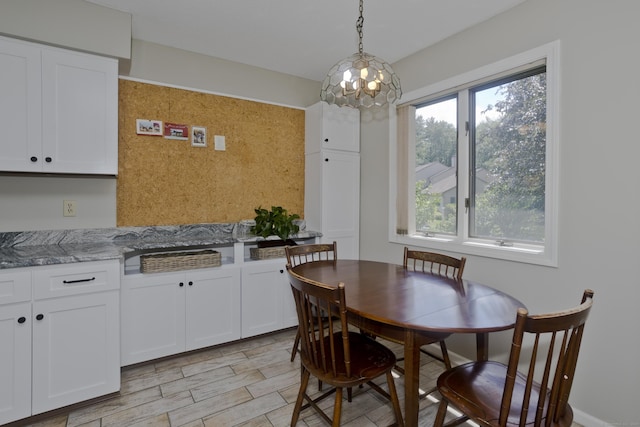 94 The Laurels Unit 94, Enfield, CT 06082 - dining area featuring a chandelier