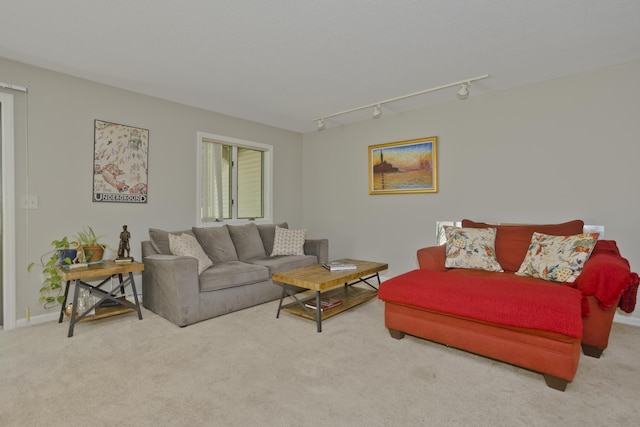 94 The Laurels Unit 94, Enfield, CT 06082 - carpeted living area featuring track lighting and baseboards