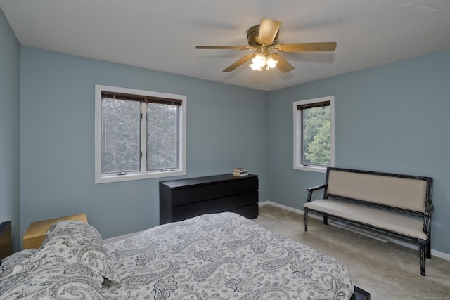 94 The Laurels Unit 94, Enfield, CT 06082 - carpeted bedroom with baseboards and a ceiling fan