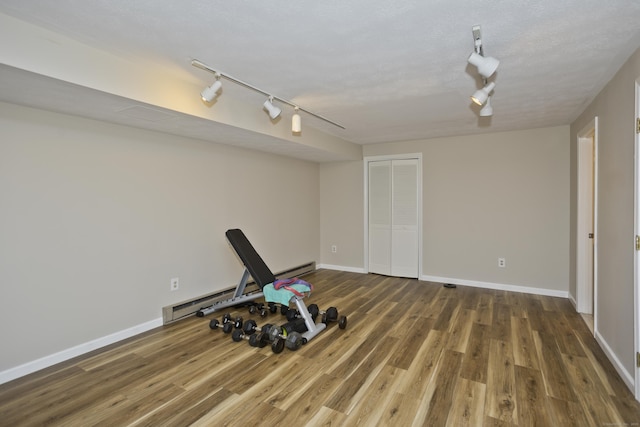 94 The Laurels Unit 94, Enfield, CT 06082 - workout area with track lighting and wood finished floors
