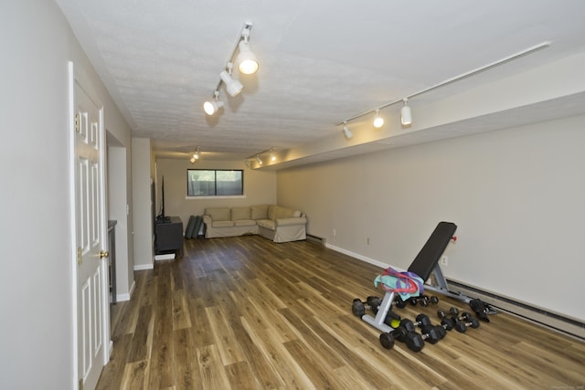 94 The Laurels Unit 94, Enfield, CT 06082 - workout room featuring track lighting and wood finished floors