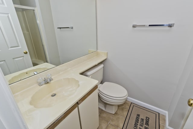 94 The Laurels Unit 94, Enfield, CT 06082 - full bath featuring tile patterned floors, a shower with shower door, and vanity