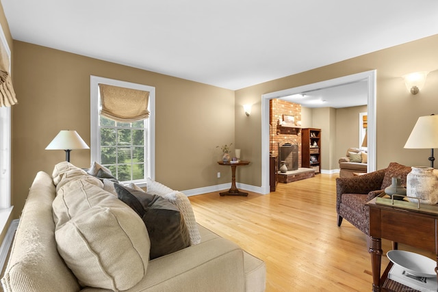 72 Hazelwood Dr, Southington, CT 06489 - living room featuring a fireplace and light wood-style flooring