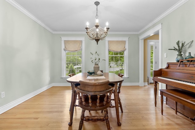 72 Hazelwood Dr, Southington, CT 06489 - dining space with a chandelier, crown molding, and light wood-type flooring