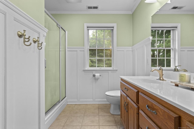 72 Hazelwood Dr, Southington, CT 06489 - bathroom with a decorative wall, vanity, a shower stall, a wainscoted wall, and tile patterned floors