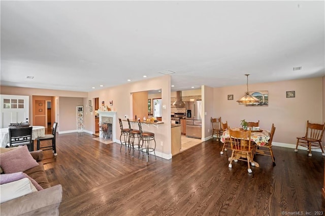 23 Sunset Hill Rd, Brookfield, CT 06804 - living area featuring light wood-type flooring, a fireplace with flush hearth, and recessed lighting