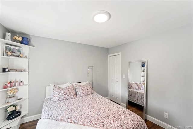 23 Sunset Hill Rd, Brookfield, CT 06804 - bedroom with dark wood-style flooring and a closet
