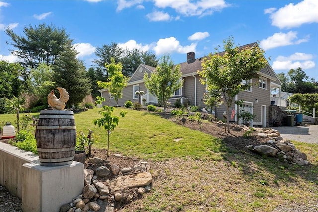 23 Sunset Hill Rd, Brookfield, CT 06804 - view of grassy yard with an attached garage and driveway