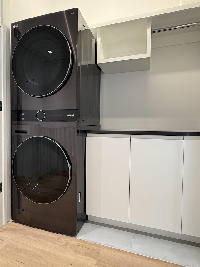 785 Post Rd E Unit 202, Westport, CT 06880 - laundry room featuring stacked washer / drying machine