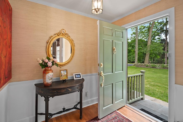 50 Pond Rd, Easton, CT 06612 - foyer entrance featuring wainscoting, wood finished floors, and ornamental molding