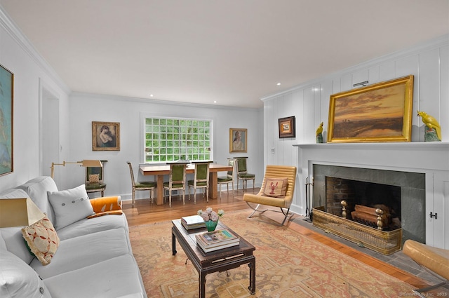 50 Pond Rd, Easton, CT 06612 - living area with ornamental molding, wood finished floors, a fireplace with flush hearth, and recessed lighting
