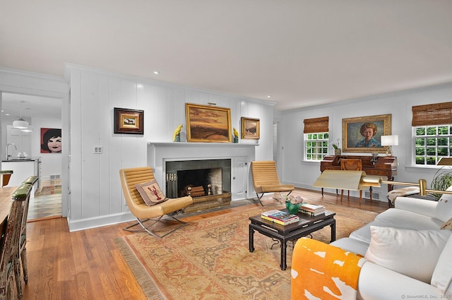 50 Pond Rd, Easton, CT 06612 - living room featuring ornamental molding, wood finished floors, and a fireplace