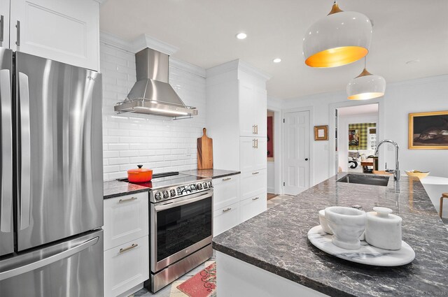 50 Pond Rd, Easton, CT 06612 - kitchen with appliances with stainless steel finishes, wall chimney exhaust hood, decorative backsplash, white cabinets, and dark stone counters
