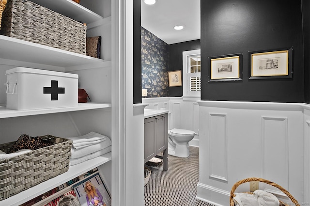 50 Pond Rd, Easton, CT 06612 - bathroom with a wainscoted wall, vanity, recessed lighting, and a decorative wall