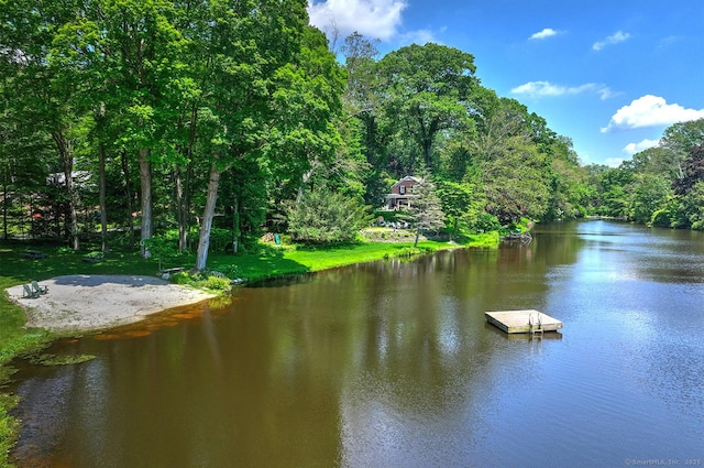 50 Pond Rd, Easton, CT 06612 - water view with a floating dock and a heavily wooded area