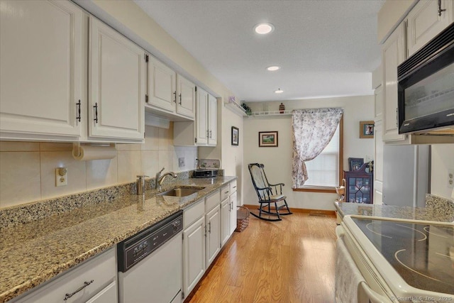 170 Summer St Unit 170, Portland, CT 06480 - kitchen with white appliances, light wood-type flooring, white cabinets, decorative backsplash, and recessed lighting