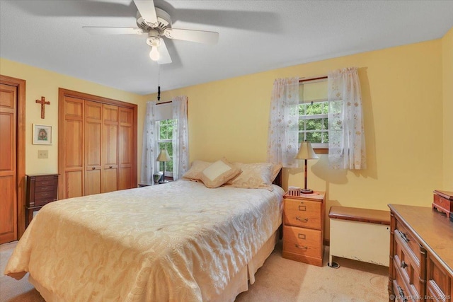 170 Summer St Unit 170, Portland, CT 06480 - bedroom with multiple windows, light colored carpet, a ceiling fan, and a closet