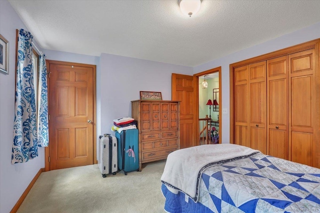 170 Summer St Unit 170, Portland, CT 06480 - bedroom featuring light carpet, a textured ceiling, and a closet