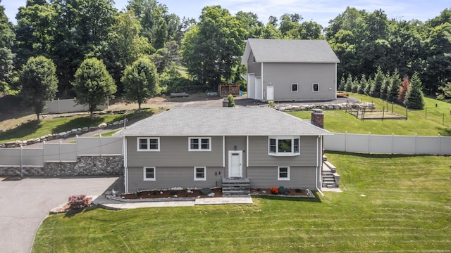 17 Stony Brook Rd, Brookfield, CT 06804 - view of front of home with entry steps, view of wooded area, and a shingled roof