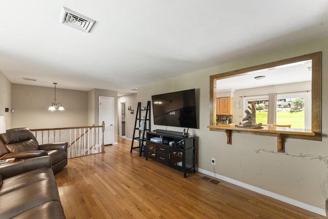 17 Stony Brook Rd, Brookfield, CT 06804 - living room with wood finished floors and a chandelier